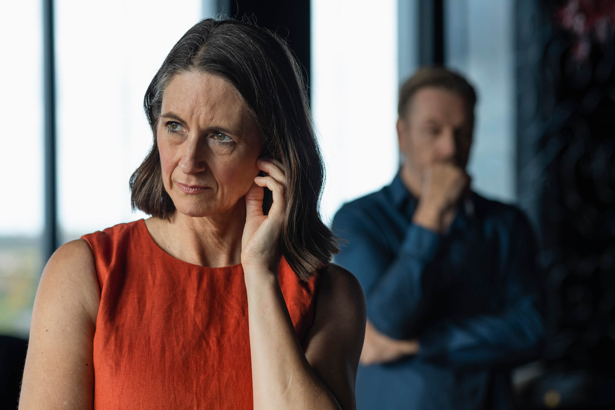 divorced couple looking away from each other